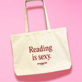 reading is sexy tote bag